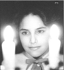 Girl with Shabbat Candles